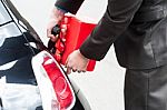 Man Refueling His Car Stock Photo