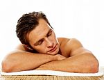 Man Relaxing In A Spa Resort On Mat Stock Photo