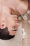 Man Relaxing In Spa Salon Stock Photo