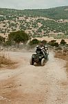 Man Riding Quad Bike Stock Photo