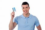 Man Showing His Credit Card Stock Photo