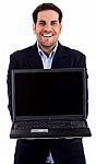 Man Showing Laptop Stock Photo