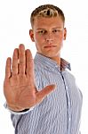 Man Showing Stop Sign Stock Photo