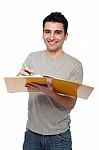 Man Studying With Dossier Stock Photo