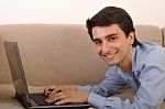 Man Surfing The Web Stock Photo