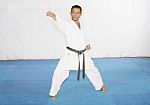 Man Training Karate In The Gym Stock Photo