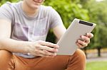 Man Use Tablet Reading News And Communicate On Social Networks Stock Photo