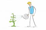 Man Watering The Plant Stock Photo