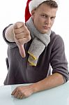 Man Wearing Hat Showing Thumb Down Stock Photo