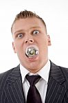 Man With Electric Bulb In His Mouth Stock Photo