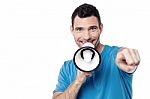 Man With Loudhailer And Pointing Forward Stock Photo