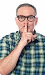 Man with silent gesture Stock Photo