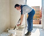 Man Worker Saws Silicate Brick Stock Photo