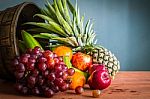 Many Fruits On Wooden Stock Photo