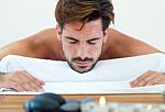 Masseur Doing Massage On Man Body In The Spa Salon Stock Photo