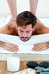 Masseur Doing Massage On Man Body In The Spa Salon Stock Photo