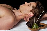 Masseur Doing Neck Massage Stock Photo