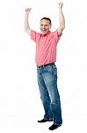 Mature Gentleman With Raised Arms Stock Photo