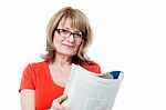 Mature Woman Reading Book Stock Photo