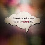 Meaningful Quote On Paper Cloud With Colorful Bokeh Background Stock Photo