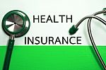 Medical Insurance Document In Green Folder Stock Photo