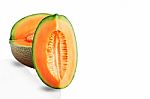 Melon Cut On White Background Stock Photo