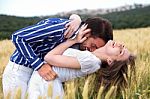 Men And Woman Hugging Stock Photo