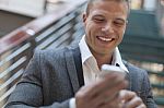 Men Read Sms On His Smartphone In Business Building Stock Photo