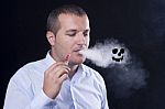 Men Smoke An Electronic Cigarette Stock Photo