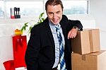 Middle Aged Businessman At His Relocated Office Stock Photo