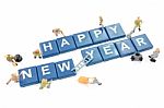 Miniature Worker Team Building Word Happy New Year On White Background Stock Photo