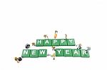 Miniature Worker Team Building Word Happy New Year On White Background Stock Photo