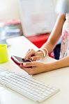 Mobile Phone In A Woman's Hand. Indoor Image Stock Photo