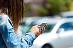 Mobile Phone In A Woman's Hand. Outdoor Image Stock Photo