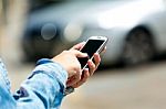 Mobile Phone In A Woman's Hand. Outdoor Image Stock Photo