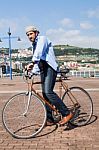 Modern Man Riding A Urban Bike Stock Photo