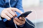 Modern Young Man With Mobile Phone In The Street Stock Photo