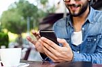 Modern Young Man With Mobile Phone In The Street Stock Photo