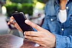 Modern Young Man With Mobile Phone In The Street Stock Photo