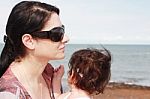 Mother And Daughter At The Beach Stock Photo