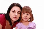 Mother And Daughter Watch TV Stock Photo