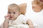 Mother Holding Little Baby Stock Photo