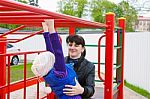 Mother Playing With Her Daughter Stock Photo