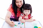 Mother With Child Girl Draw And Paint Together. Isolated On Whit Stock Photo