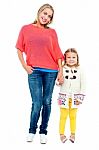 Mum And Daughter Posing In Trendy Outfits Stock Photo