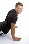 Muscular Man Doing Push Ups Stock Photo