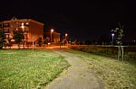 Night Public Park In The City With Houses Near Stock Photo