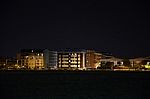 Night Public Park In The City With Houses Near Stock Photo