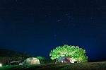 Night Sky With Star On Top Of Mountain Stock Photo