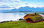 Norway Island In Fjord. Cloudy Nordic Day. Hotel On Island Stock Photo